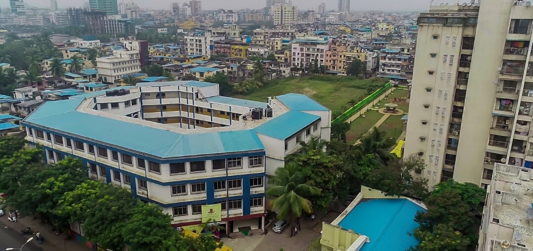Vashi Sector 26_a city with lots of tall buildings and lots of trees